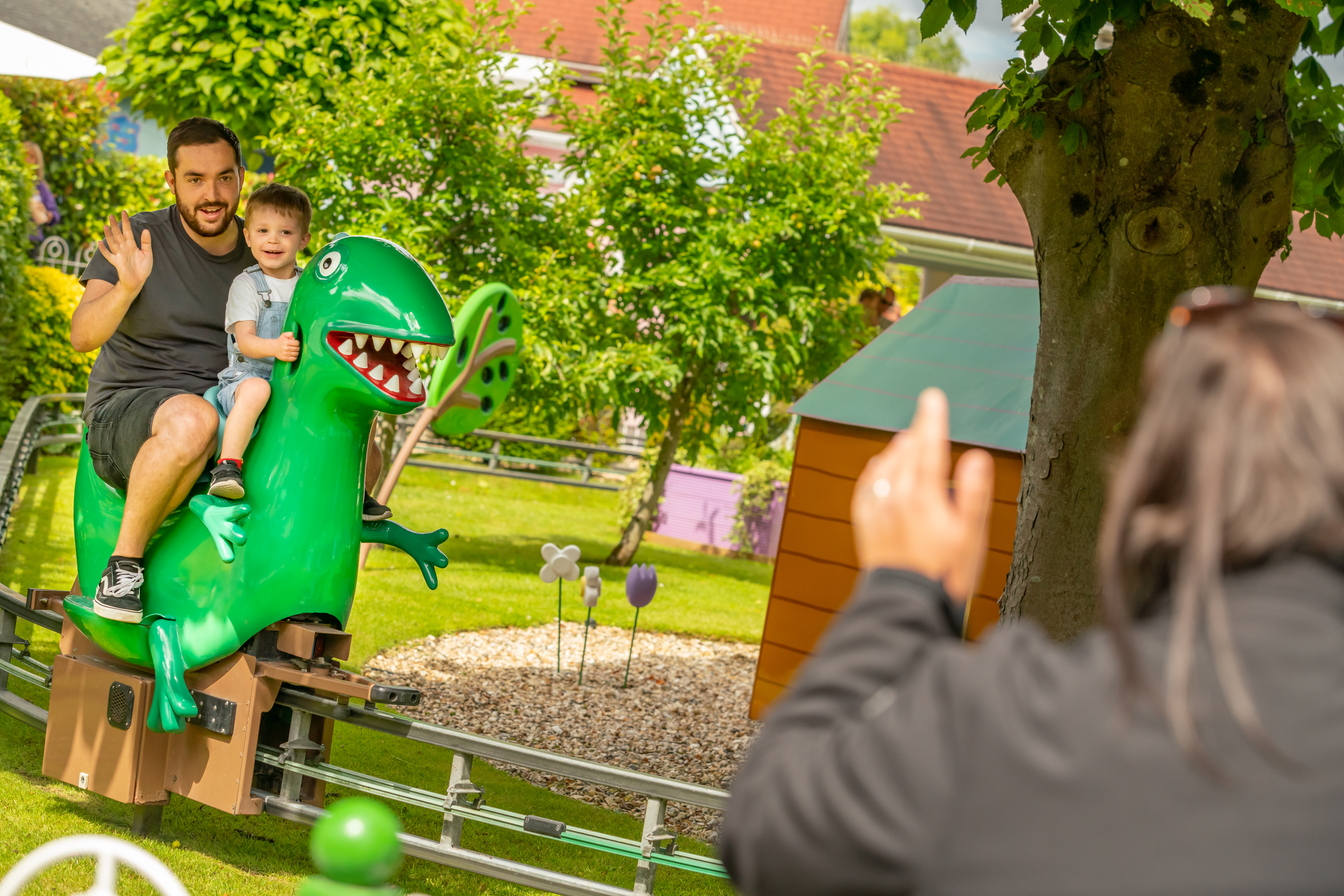 Family enjoying a Peppa Pig World ride together