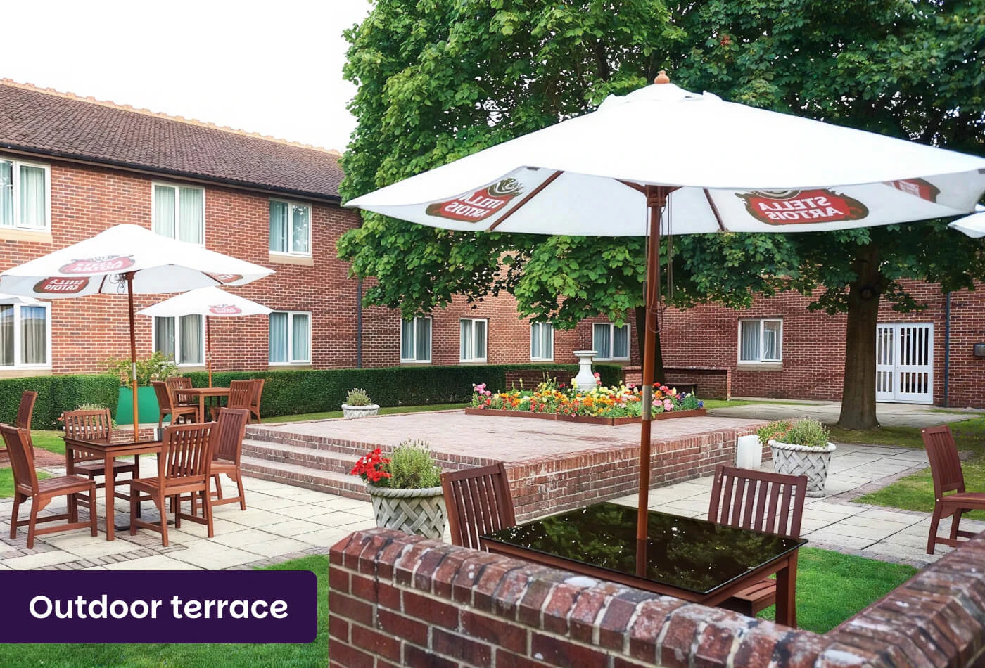 Outdoor terrace seating at Orida Newbury Hotel