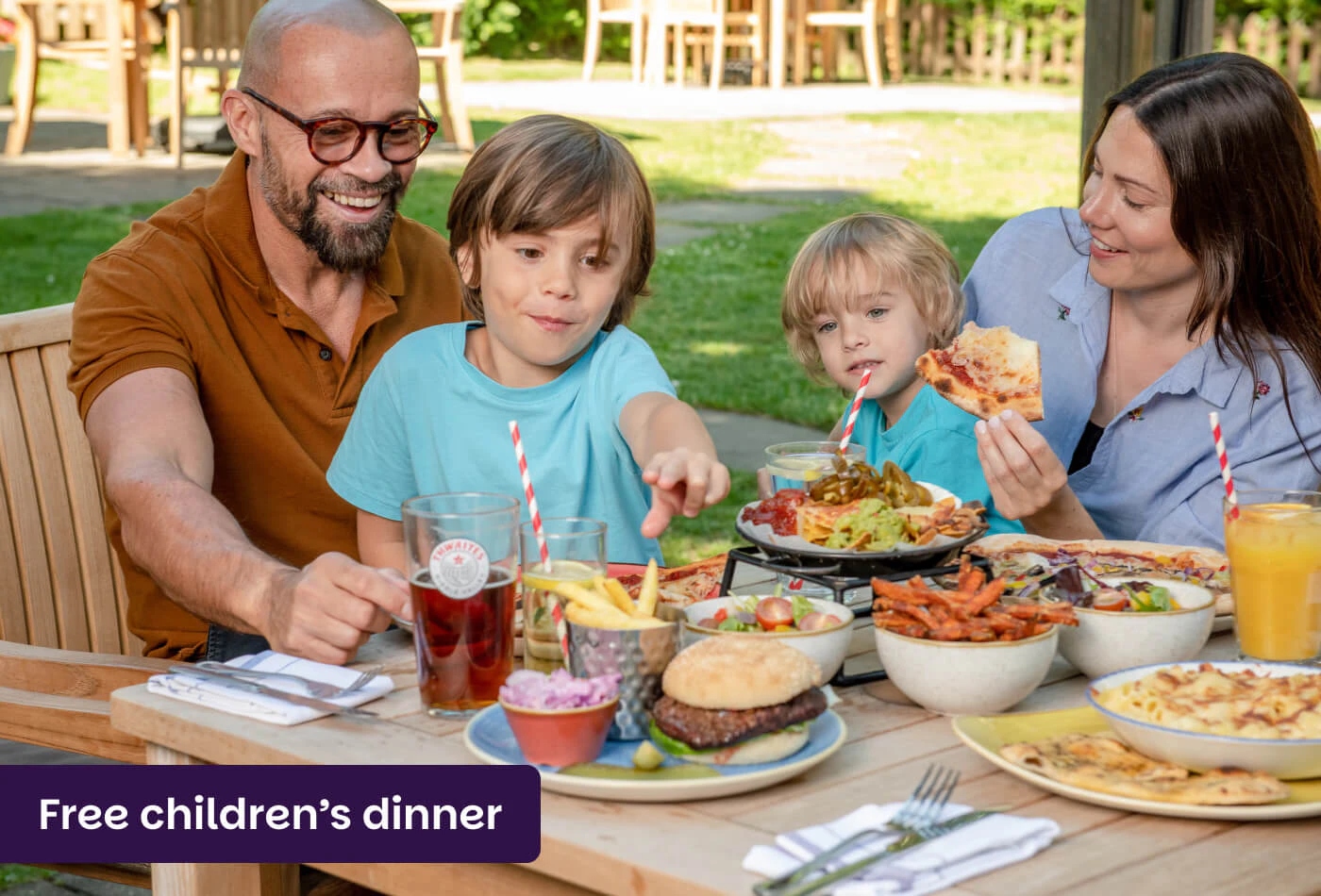 Family enjoying an outdoor meal at Lodge at Solent